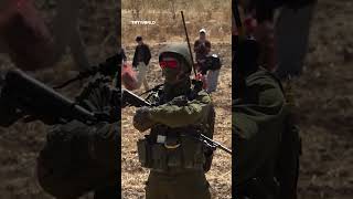 Palestinians pray on West Bank farmland in Hebron as Israeli army declares area closed military zone