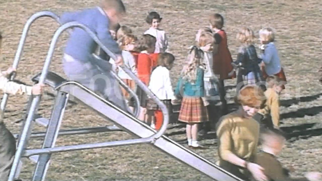 1960s Elementary School Playground - Female Teacher