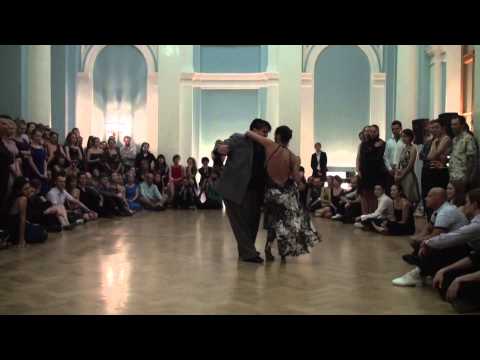  Alejandra Mantinan  and  Aoniken Quiroga  are  dancing  to  a  tango