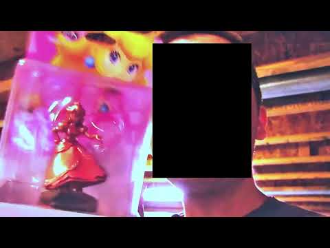 nameless deity gets sent a pink gold peach amiibo