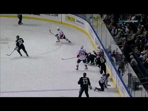 Dana Tyrell runs over Patrick Wiercioch