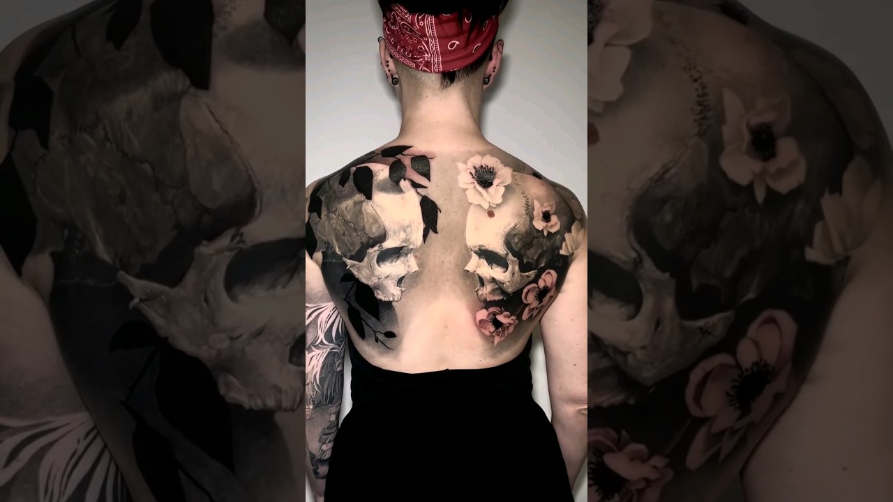 The skull and flowers can symbolize the start of a new life by artist: @lisaammer