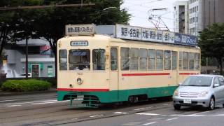 preview picture of video '富山市内電車デ7000形 富山駅前到着 Toyama City Tram'