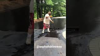 How to brush or squeegee sealcoat on asphalt.