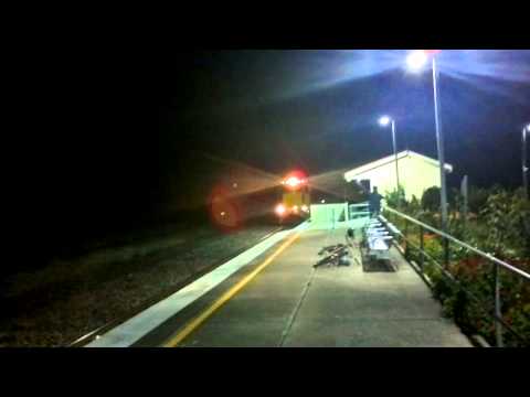 QRNational 2482D & 1743D on freight train pumpin northbound through Howard Queensland