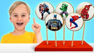 Kids pretend play with superhero cookies