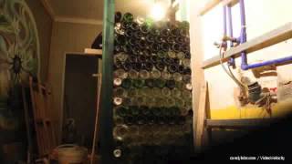 preview picture of video 'Recycled bottles wall at Tribo da Praia Eco Hostel'