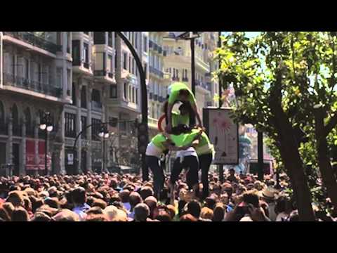 Performers doing a trick and one falls onto crowd - Fallas 2016