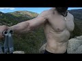 Ripped old man over 50. Posing and flexing muscles