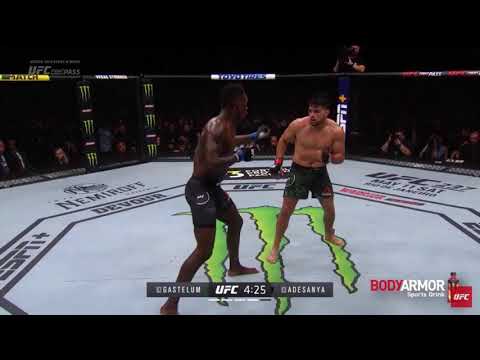 Israel Adensanya using the question mark kick to straight right combo