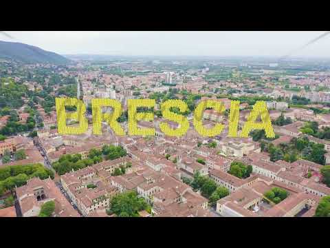 Inscription on video. Brescia, Italy. Sant Afra, Brescia. Arnaldo Square. Knitted texture inscriptio