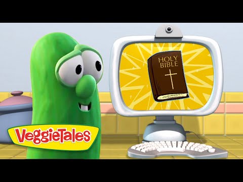 Green VeggieTales character smiles at a computer monitor showing a Bible illustration on a yellow sunburst background.
