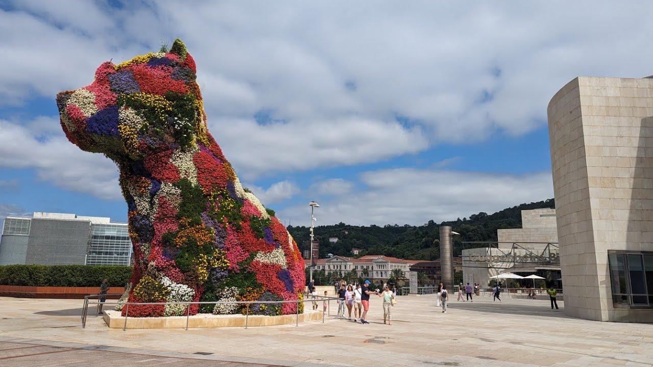 Immersive street-level walking tour through Bilbao Guggenheim, Spain, showcasing authentic urban landscapes, local architecture, and the vibrant atmosphere of the city's neighborhoods