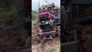 This Tractor Fight to Escape a Muddy Water Trap