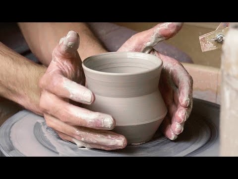 pottery making: repetition throwing and trimming of geometric angular cups