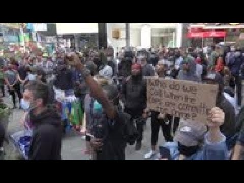 Protesters assemble in Times Square before curfew