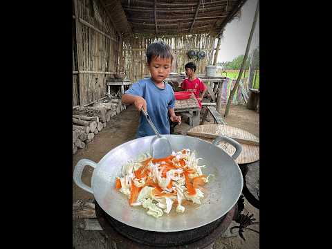 Adorable Little boy cooking food
