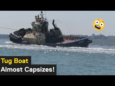 Tug boat nearly capsized by gigantic container ship at Felixstowe port in Suffolk