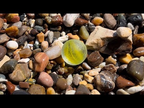 Another yellow sea glass marble. #SeaGlass #beach #explore