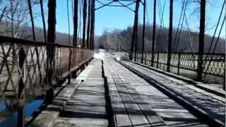 preview picture of video 'Ridealong over Cave Springs Bridge & 24mph mountain-bike pass'