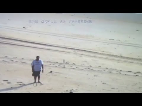 Video shows boater signaling for help on beach
