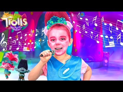 Levi and Ivy Help Trolls Princess Poppy with Music!