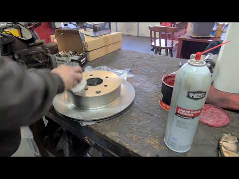Front and Rear Brake Pads & Rotors on a 2015 Infinity Q50