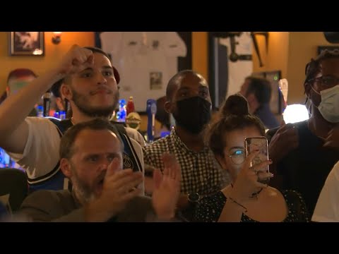 Euro 2020: France fans watch the Hungary v France match in a bar | AFP