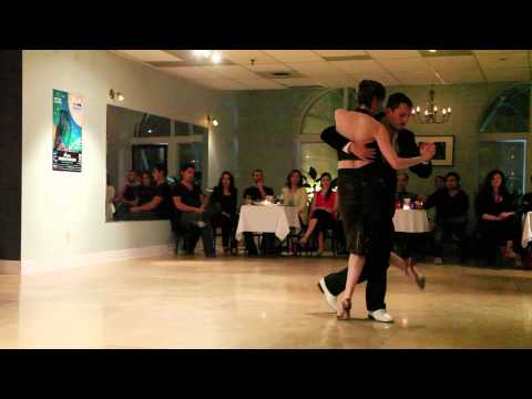  Evan Griffiths  and  Rebecca Shulman  are  dancing  to  the  tango  "  Un dilema  "  by  Julio de Caro  in  2013