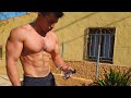 young bodybuilder showing his pumped muscle | flexing | muscle worship