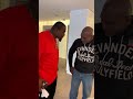 EVANDER HOLYFIELD LOOKING LIKE HE'S READY TO FIGHT RIDDICK BOWE!