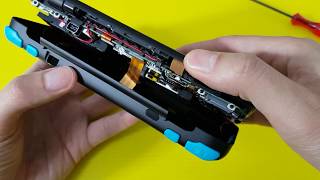 New Nintendo 2DS XL - Disassembly Removing Back Cover - Tear Down - Hinge Design June 2017