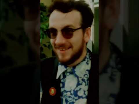 Thumbnail for Backstage at the Live Aid Benefit Concer in (1885). #elviscostello #music #shorts by Elvis Costello