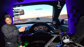 Gran Turismo 7 Sitting on 77" OLED TV, G-Pro Wheelbase, Surround Sound