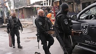 Download the video "Rio police free hostages in raid that leaves eight dead"