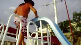 preview picture of video 'Traveling Gnome on catamaran slide Couples Resort  Negril, Jamaica 09-03- 09'