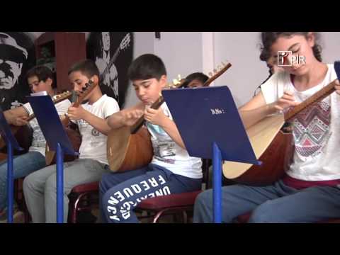 Dersim'in kucuk cocuklarinin telli kuran ile yarattigi güzellik