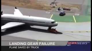 A car saves a plane with landing gear failure! AMAZING