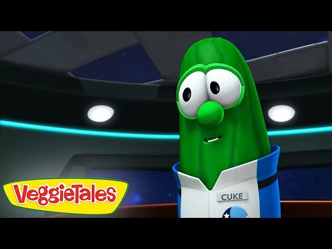 Green cucumber VeggieTales character in a blue-and-white uniform with a 'Cuke' name tag, inside a futuristic control room.