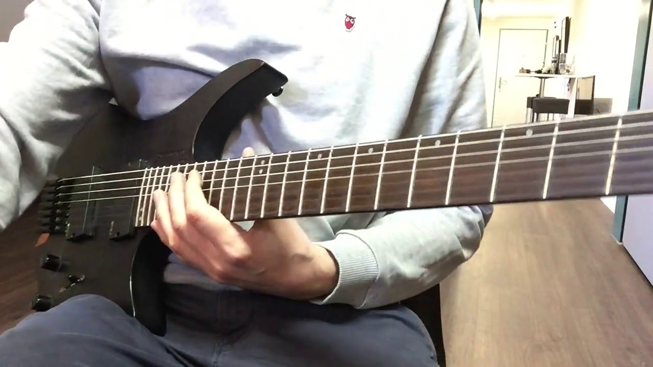 Roberto Barlocci playing a percussive funk rhythm riff on electric guitar