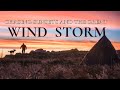 wild camping on a windy mountain top chasing sunsets and night sky