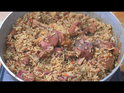 Solo preparó arroz de esta manera, con costilla, chuletas, guandules