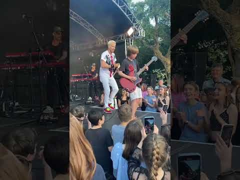 Can't believe this happened! 🤯 10 year old asks band at festival to let him play guitar..