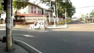 preview picture of video 'Just people and traffic at Tarlac State University in Tarlac City, Philippines'