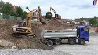 preview picture of video 'MAN TGS DUMP TRUCK &Cat 318B L / Bauprojekt in Leutenbach, 2013.'