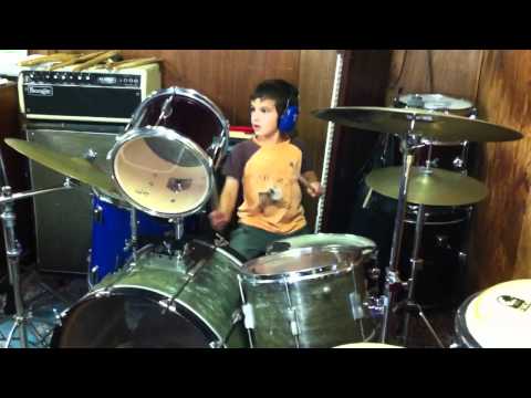 Judah plays Latin beats on the drums