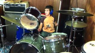 Judah plays Latin beats on the drums