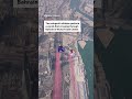 Wingsuit athletes fly between Bahrain towers in world-first stunt - Video