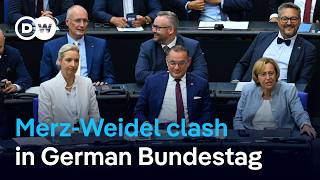 Merz calls AfD 'remigration' plan 'ethnic cleansing' in fiery debate | DW News