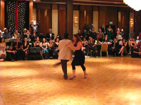  Fernando Sanchez  and  Ariadna Naveira  are  dancing  to  the  tango  "  Amurado  "